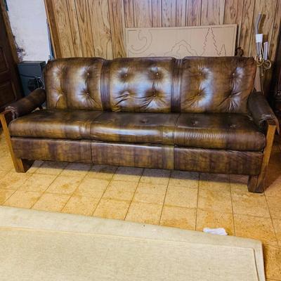 LOT 82: Mid Century Brown Faux Leather Sofa and Arm Chair with Wood Arms/Legs