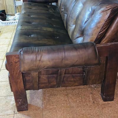 LOT 82: Mid Century Brown Faux Leather Sofa and Arm Chair with Wood Arms/Legs