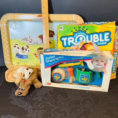 LOT 90: Collection of Children’s Toy, Game and More Featuring a Pound Puppy TV Tray, Vintage Junior Shaving Kit a Mini Pound Puppy and More