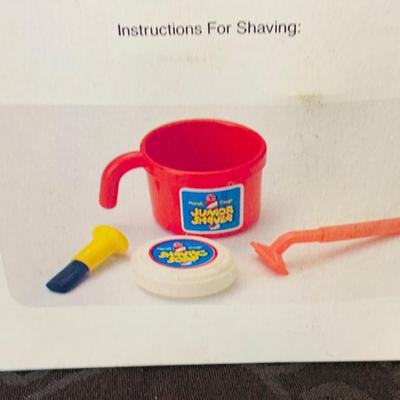 LOT 90: Collection of Children’s Toy, Game and More Featuring a Pound Puppy TV Tray, Vintage Junior Shaving Kit a Mini Pound Puppy and More