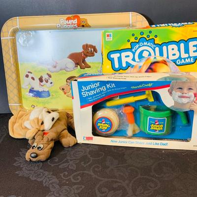 LOT 90: Collection of Children’s Toy, Game and More Featuring a Pound Puppy TV Tray, Vintage Junior Shaving Kit a Mini Pound Puppy and More