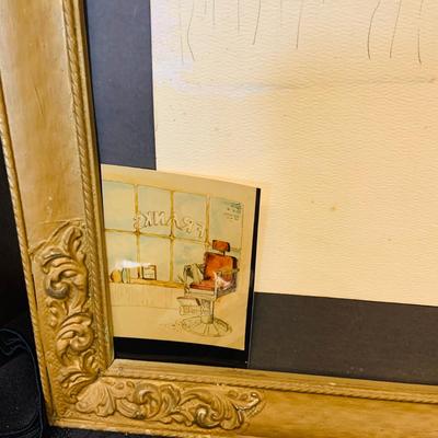 LOT 91: Barber Shop Memorabilia a Framed Etching, Cast Iron Haircut Plaque, Wooden Barber Poll, Books and Mor