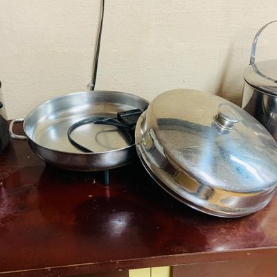 LOT 95: Collection of Stainless Steel Cookware including a Farberware Electric Skillet, Pots, Pans and Colander/Strainers