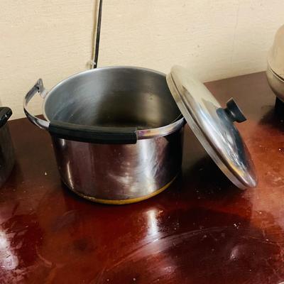 LOT 95: Collection of Stainless Steel Cookware including a Farberware Electric Skillet, Pots, Pans and Colander/Strainers