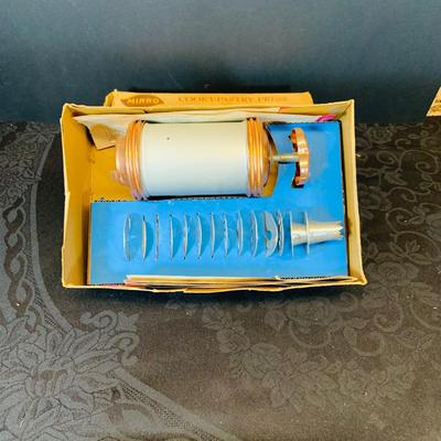 LOT 96: Vintage Waring Blender, Sunbeam Radiant Control Toaster, and Mirro Pastry Press In Original Box