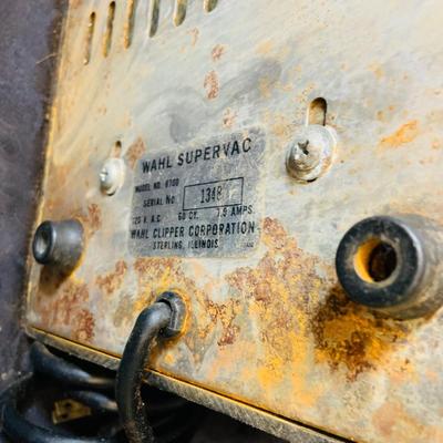 LOT 98: Vintage Barber Shop Supplies Including a Wahl Super Vac Shaver, Schick Hot Lather Shaving Cream Dispenser, Vintage Louis Hair...