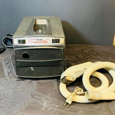 LOT 98: Vintage Barber Shop Supplies Including a Wahl Super Vac Shaver, Schick Hot Lather Shaving Cream Dispenser, Vintage Louis Hair...