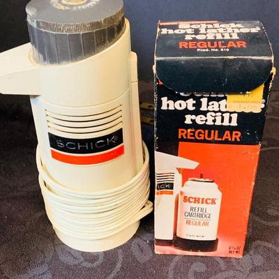 LOT 98: Vintage Barber Shop Supplies Including a Wahl Super Vac Shaver, Schick Hot Lather Shaving Cream Dispenser, Vintage Louis Hair...