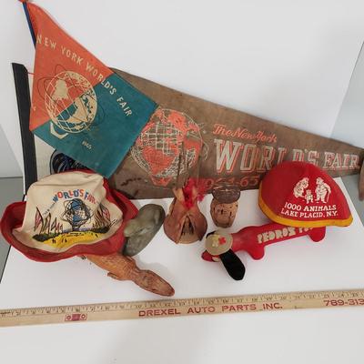 LOT 120: Vintage Travel Memorabilia; World's Fair, Cherokee Art, Jupiter Hammerheads, and So Much More