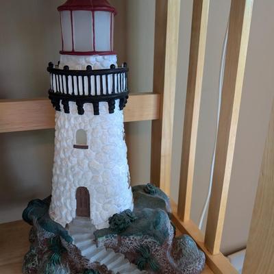Sale Photo Thumbnail #70: Lighthouse figure, painted, approximately 1 ft tall