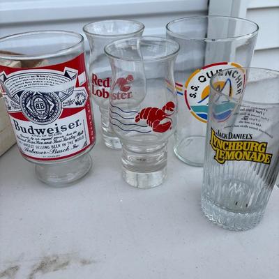 Bar, glassware and vintage Coca-Cola and other bottles