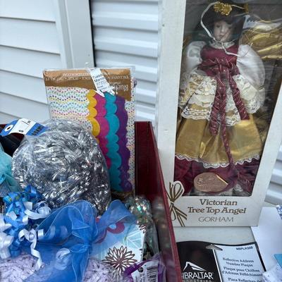 Ribbon and wrapping, lantern, lights, address plaque, and