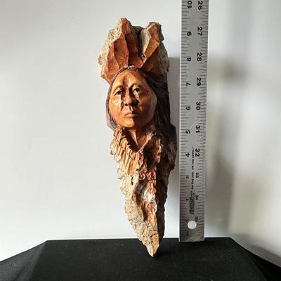 First Nations Woman Carved from Wood wall art