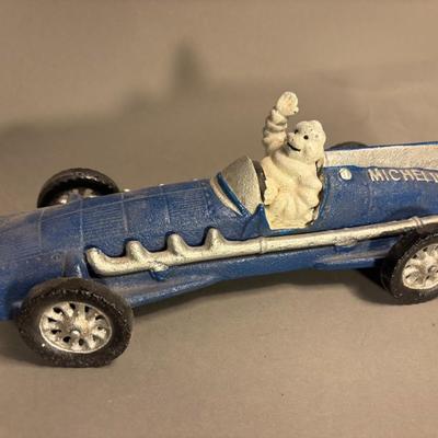 Antique Michelin Man Driving Figurine Blue Car