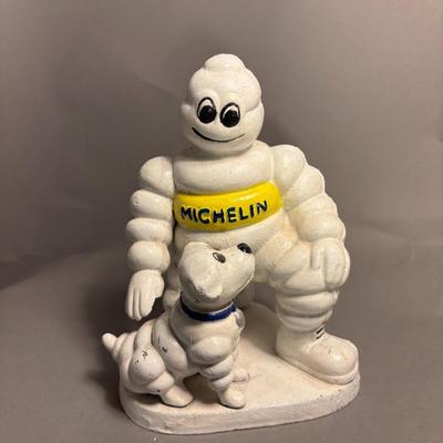 Antique Michelin Man Petting Dog Figurine