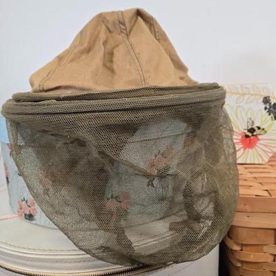 LOT 97: The Mad Hatter's Hat, Fur Hat and Hand Muff, and Bee Keeper's Necessities