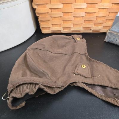 LOT 97: The Mad Hatter's Hat, Fur Hat and Hand Muff, and Bee Keeper's Necessities