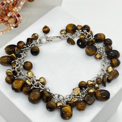LOT 164J: Triple Strand Tiger Eye Necklace, Puka Shell Necklace, Tiger Eye Sterling Bracelet and More!