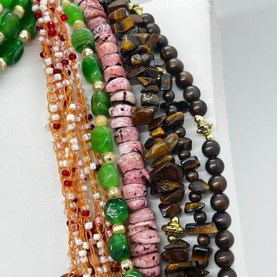 LOT 164J: Triple Strand Tiger Eye Necklace, Puka Shell Necklace, Tiger Eye Sterling Bracelet and More!