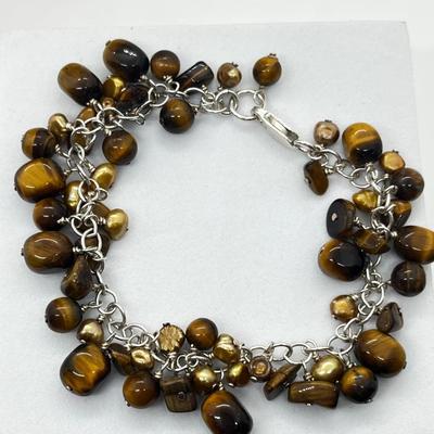 LOT 164J: Triple Strand Tiger Eye Necklace, Puka Shell Necklace, Tiger Eye Sterling Bracelet and More!