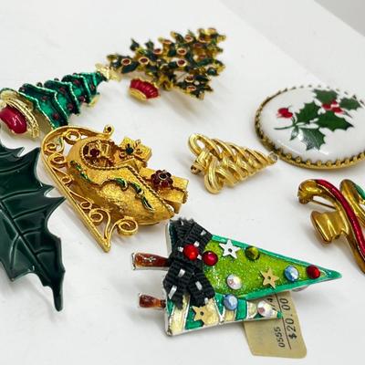 LOT: 191J: Christmas Brooch Lot: Avon, AJMC and More