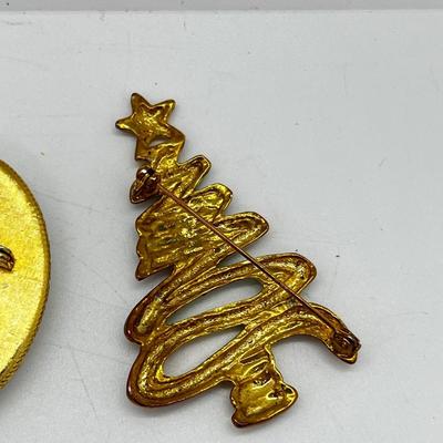 LOT: 191J: Christmas Brooch Lot: Avon, AJMC and More