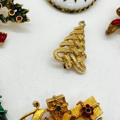 LOT: 191J: Christmas Brooch Lot: Avon, AJMC and More