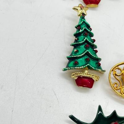 LOT: 191J: Christmas Brooch Lot: Avon, AJMC and More