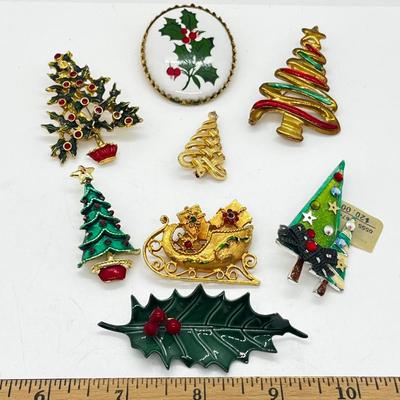 LOT: 191J: Christmas Brooch Lot: Avon, AJMC and More