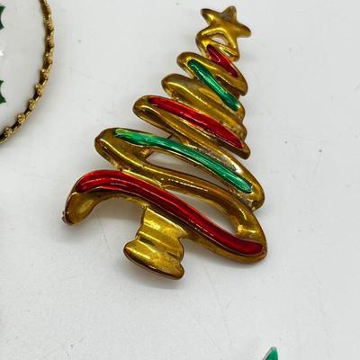 LOT: 191J: Christmas Brooch Lot: Avon, AJMC and More