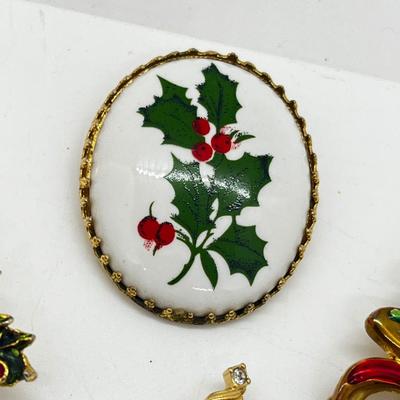 LOT: 191J: Christmas Brooch Lot: Avon, AJMC and More
