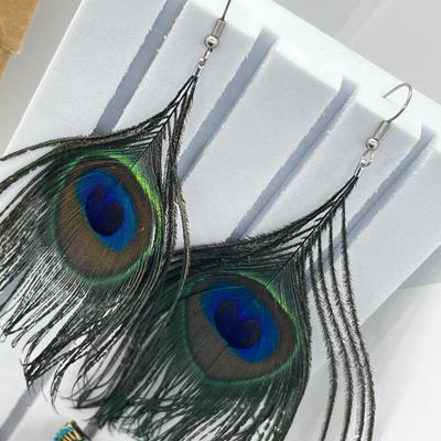 LOT 192J: Peacock Lot! Earrings, Brooch, Picture Frame, Ceramic Dish, Glass Bottle, Custom Bedazzled Phone Case