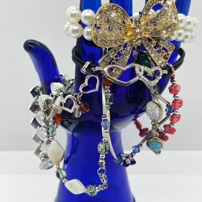 LOT 197J: Bracelet Lot Including 925 Heart Toggle Bracelet, Judy Lee Scarab Bracelet and More