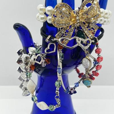LOT 197J: Bracelet Lot Including 925 Heart Toggle Bracelet, Judy Lee Scarab Bracelet and More