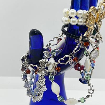 LOT 197J: Bracelet Lot Including 925 Heart Toggle Bracelet, Judy Lee Scarab Bracelet and More