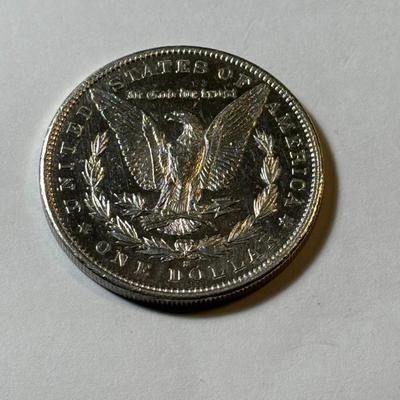 1897-S UNCIRCULATED/MS60 GRADE CLEANED MORGAN SILVER DOLLAR AS PICTURED.