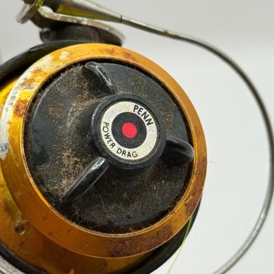 LOT 64L: Fishing Reels: Penn 710Z & Stainless Steel Shakespeare Platinum