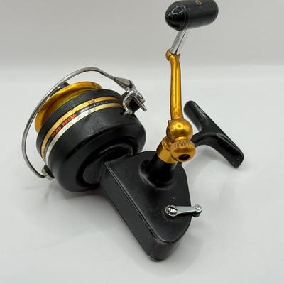 LOT 64L: Fishing Reels: Penn 710Z & Stainless Steel Shakespeare Platinum