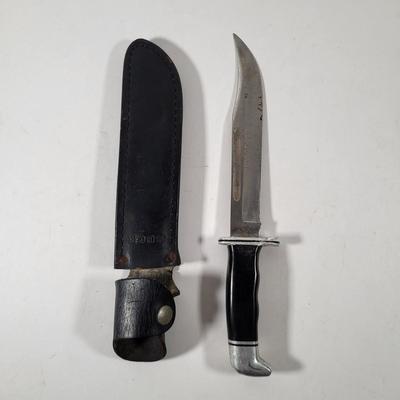 LOT 106: Three Various Outdoor Sportsman Knives with Holders