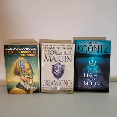 LOT 110: Seventeen Assorted Fiction Books Featuring Dean Koontz and More