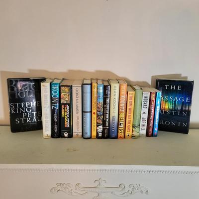 LOT 110: Seventeen Assorted Fiction Books Featuring Dean Koontz and More