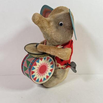 LOT 146L: 1960s Elephant One Man Band Wind Up Toy, Vintage Ceramic Doll made in Japan & Composite Mini Doll