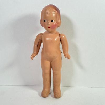 LOT 146L: 1960s Elephant One Man Band Wind Up Toy, Vintage Ceramic Doll made in Japan & Composite Mini Doll