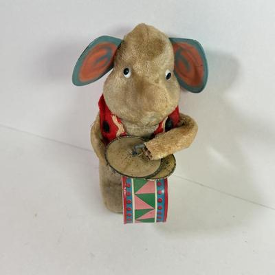 LOT 146L: 1960s Elephant One Man Band Wind Up Toy, Vintage Ceramic Doll made in Japan & Composite Mini Doll