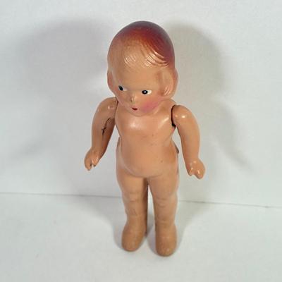 LOT 146L: 1960s Elephant One Man Band Wind Up Toy, Vintage Ceramic Doll made in Japan & Composite Mini Doll