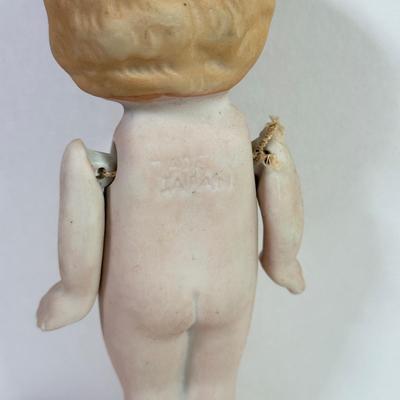 LOT 146L: 1960s Elephant One Man Band Wind Up Toy, Vintage Ceramic Doll made in Japan & Composite Mini Doll