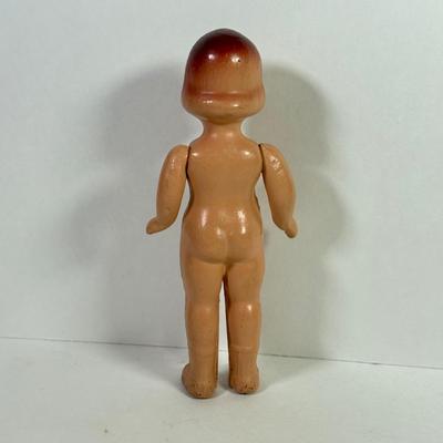 LOT 146L: 1960s Elephant One Man Band Wind Up Toy, Vintage Ceramic Doll made in Japan & Composite Mini Doll