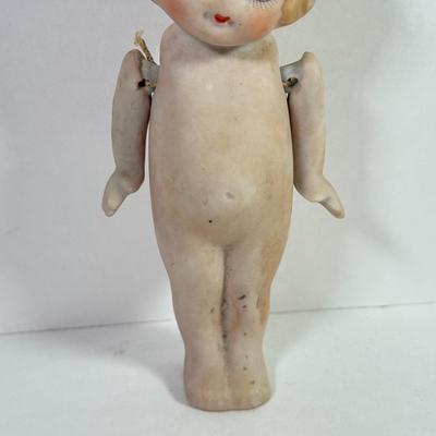 LOT 146L: 1960s Elephant One Man Band Wind Up Toy, Vintage Ceramic Doll made in Japan & Composite Mini Doll