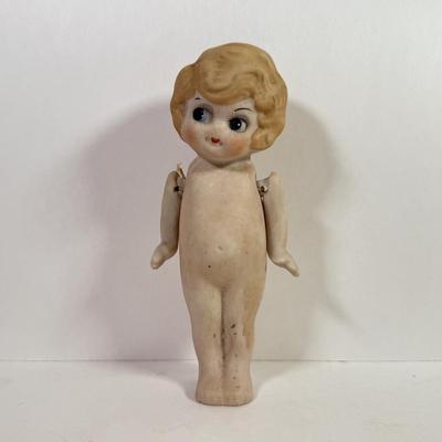 LOT 146L: 1960s Elephant One Man Band Wind Up Toy, Vintage Ceramic Doll made in Japan & Composite Mini Doll