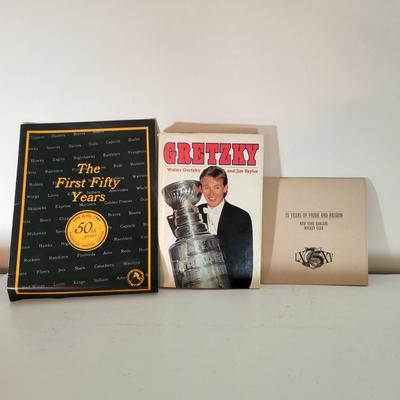 LOT 156: Fifteen Various Paperback Hockey Books and Hockey/Baseball Trading Cards